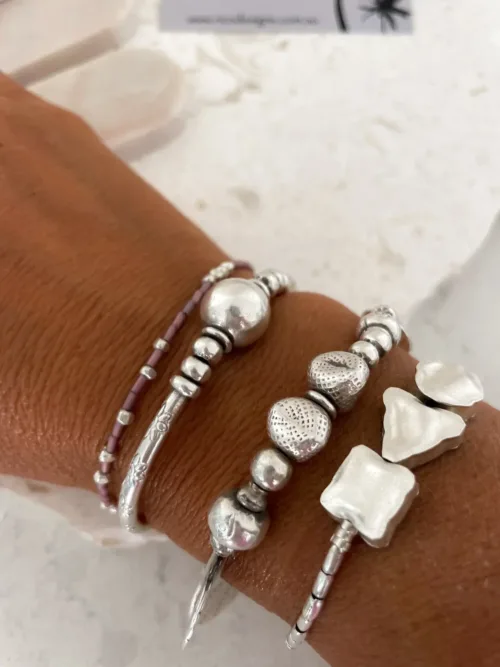 unique handmade pure silver bracelets. add texture to your bracelet stack. women's silver jewellery water safe