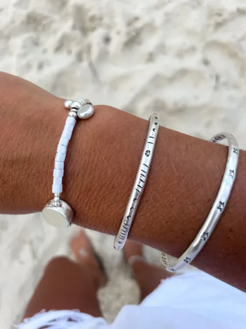 pure silver bracelet perfect two add texture to a bracelet stack. beach vibes and ocean safe. staple jewellery for everyday wear.