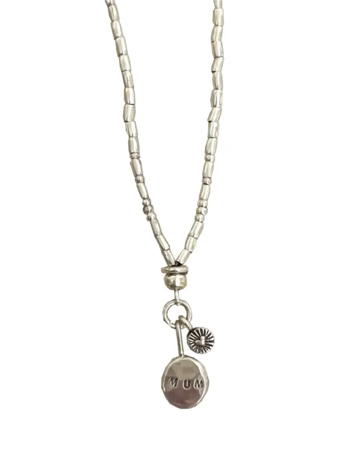 hand stamped mum pendant handmade pure silver necklace perfect for mothers day ocean safe and tug proof for active mums. Customisable hand stamped handmade sterling-silver blob pendant necklace