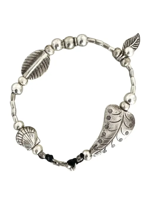 pure silver women's bracelet. heart and shell details - ocean safe. beach girl vibes