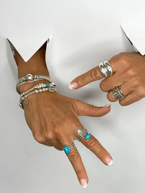 pure silver bracelet with turquoise gemstones. the perfect addition to add texture to your bracelet stack. ocean safe silver jewelry