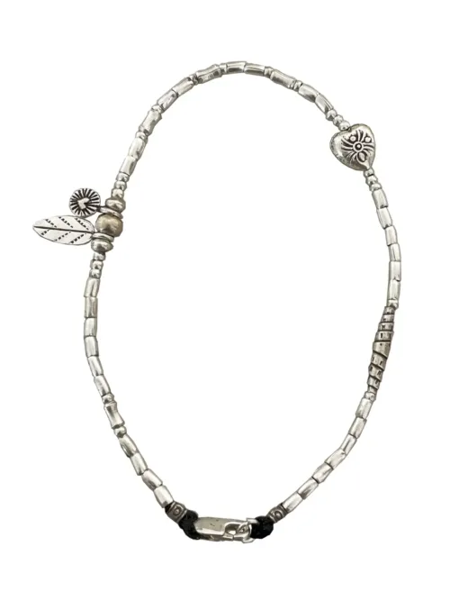 pure silver anklet minimal design. Featuring silver heart charms. Ocean safe and perfect to wear everyday.