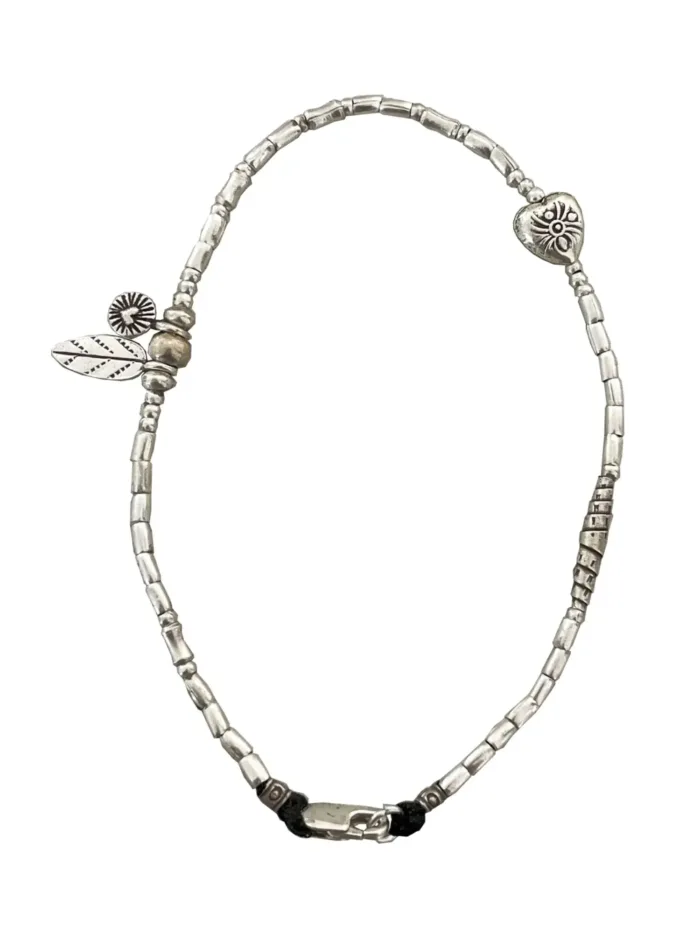 pure silver anklet minimal design. Featuring silver heart charms. Ocean safe and perfect to wear everyday.