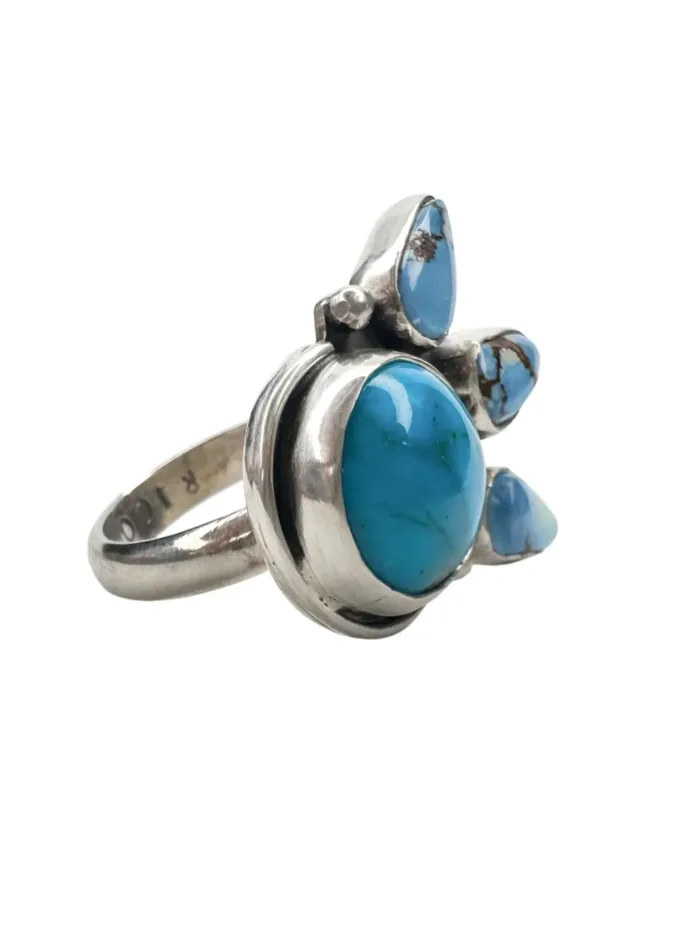 handmade turquoise ring. featuring Kingman turquoise and golden hill turquoise. Unique one of a kind bohemian style ring.