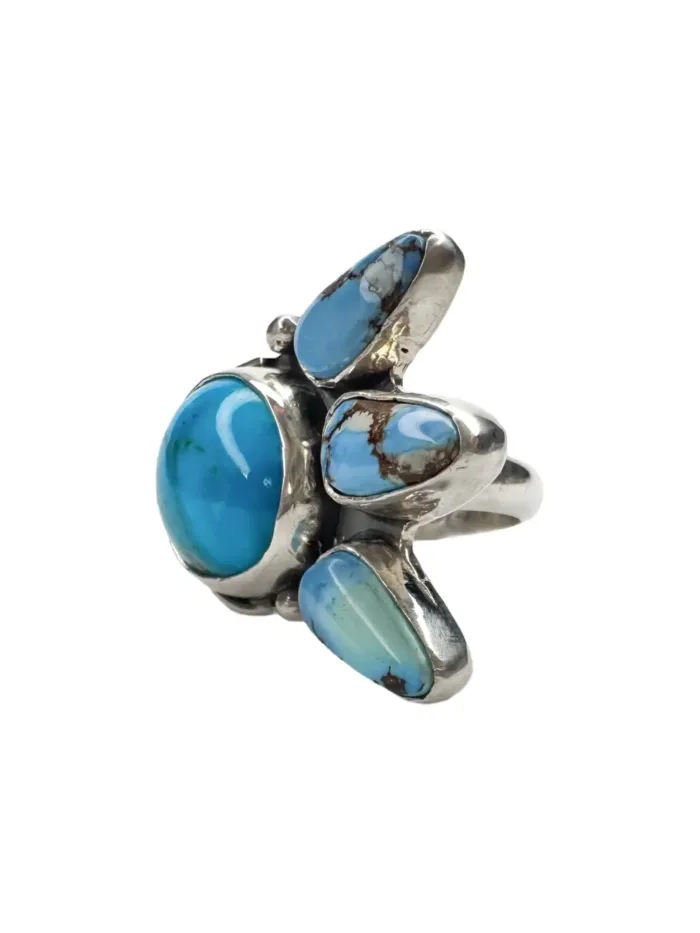 handmade turquoise ring. featuring Kingman turquoise and golden hill turquoise. Unique one of a kind bohemian style ring.