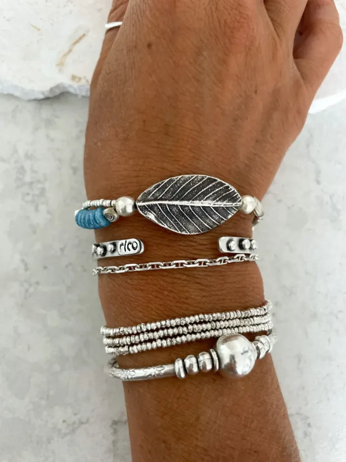 pure silver bracelet with large leaf centre. and pop of colour for your summer bracelet stack. ocean safe silver jewelry