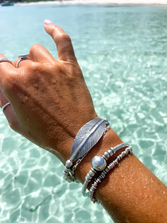 chunky pure silver bracelet perfect for stacking. large curve leaf for bohemian style. easy to slip on stretch elastic
