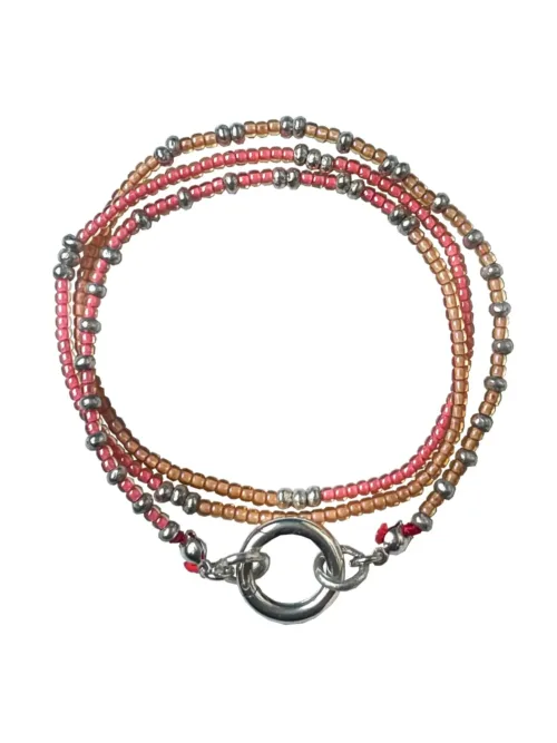 Handmade pure silver wrap bracelet featuring peach colour seed beads – a great minimal wrap bracelet style for everyday wear