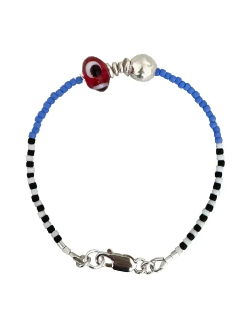 Handmade pure silver bracelet featuring colourful seed beads and an evil eye – a great minimal bracelet to add to your bracelet stack