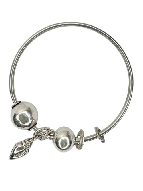 sterling silver bangle with pure silver ball beads and shell charm tassel. Handmade and ocean inspired. ocean safe and perfect to wear everyday