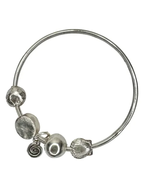 sterling silver bangle with pure silver ball beads and shell charm tassel. Handmade and ocean inspired. ocean safe and perfect to wear everyday