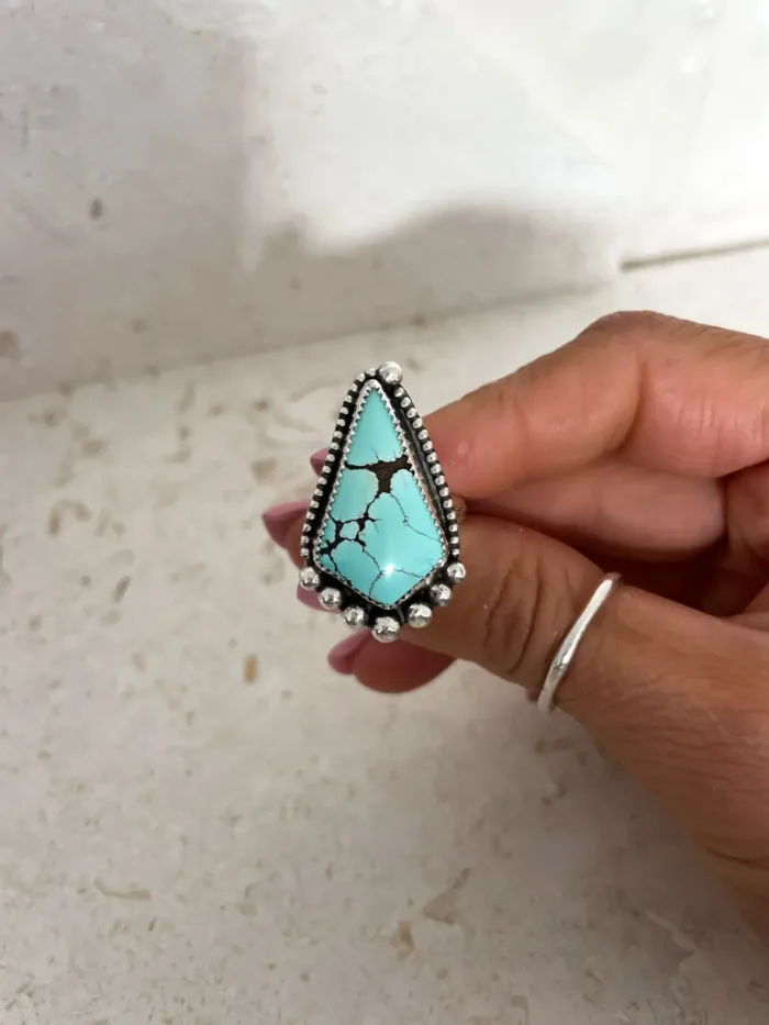 handmade sterling silver natural turquoise gemstone ring by rico designs silver jewellery. handmade in Sydney Australia