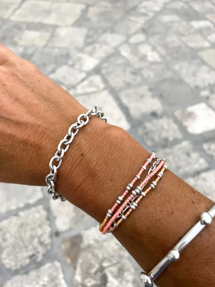 Handmade pure silver wrap bracelet featuring peach colour seed beads – a great minimal wrap bracelet style for everyday wear