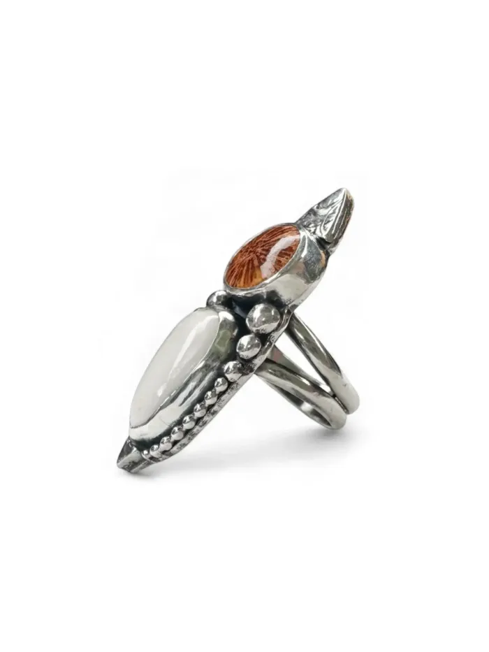 handmade sterling silver ring with white buffalo gemstone and fossilised coral. Stunning ocean inspired ring.