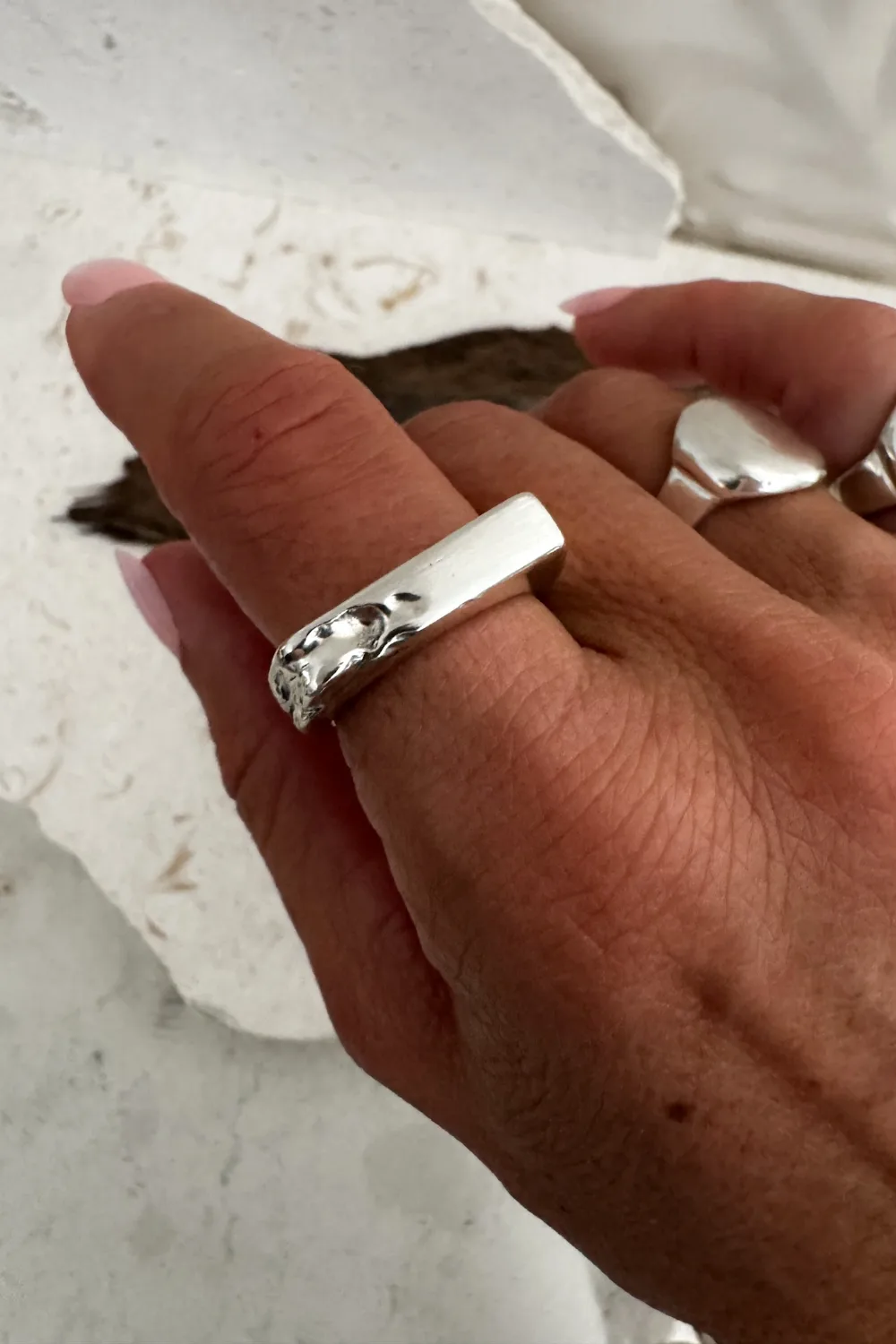 silver signet ring with eroded edge. handmade ring