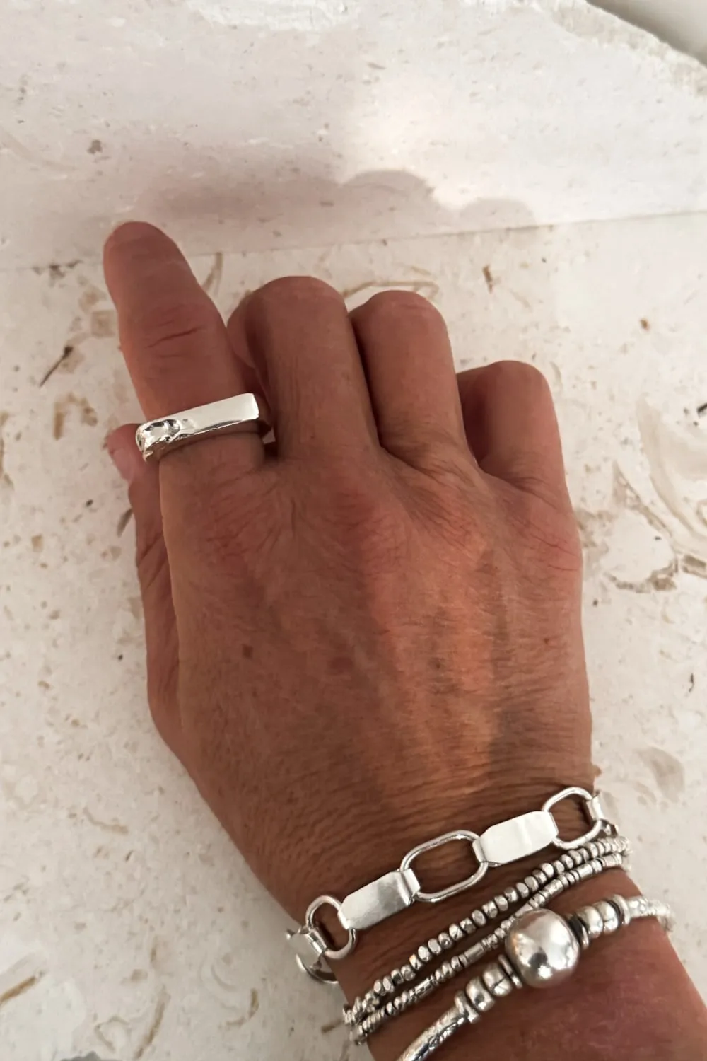 silver signet ring with eroded edge. handmade ring