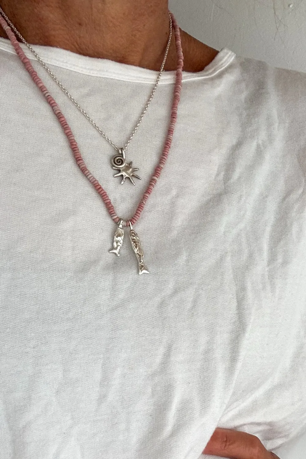 with spiral pendant on a sterling silver chain necklace