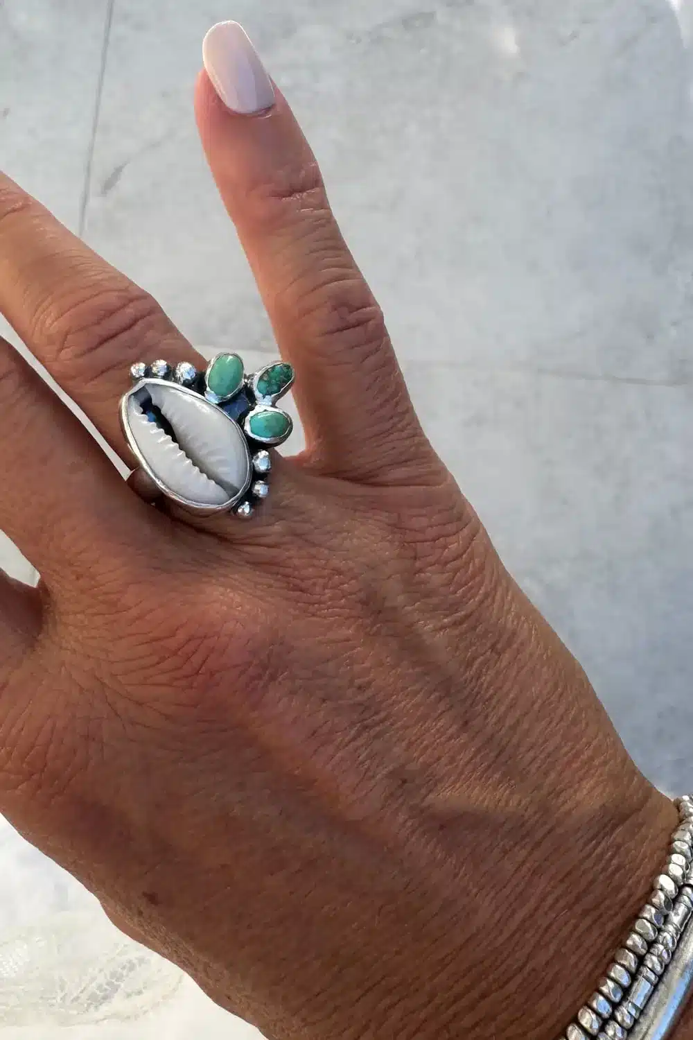 natural cowrie shell with very valley turquoise cluster sterling silver ring