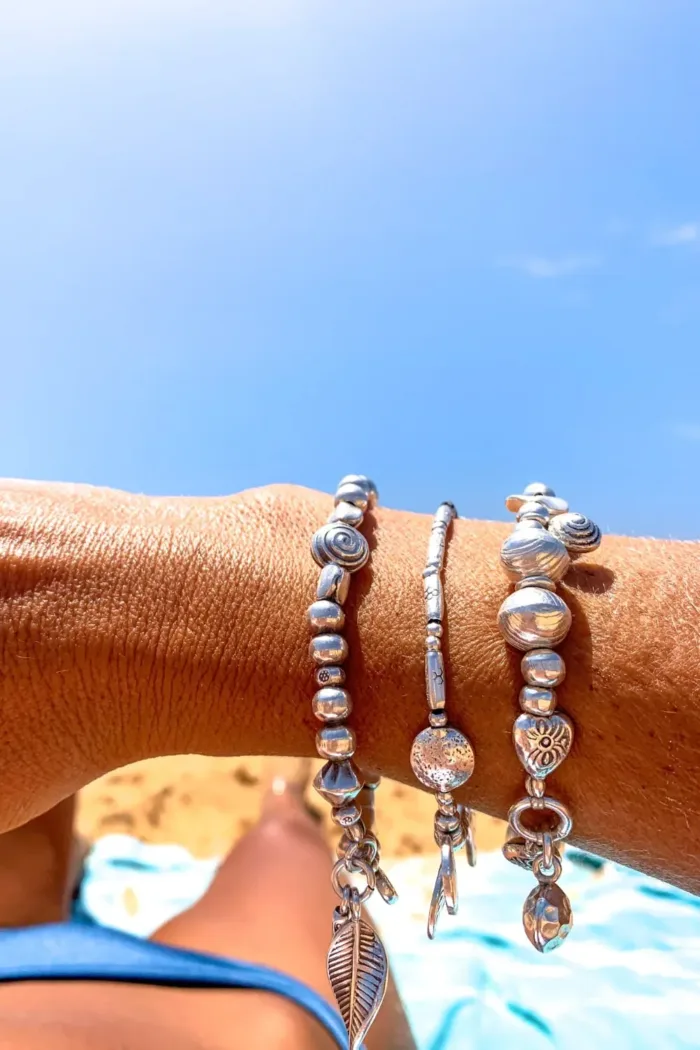 handmade pure silver bracelet. perfect for a bracelet stack. Stitch elastic so easy to slip on. ocean safe