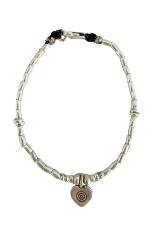 heart charm minimal style pure silver bracelet. Wear every day - ocean safe