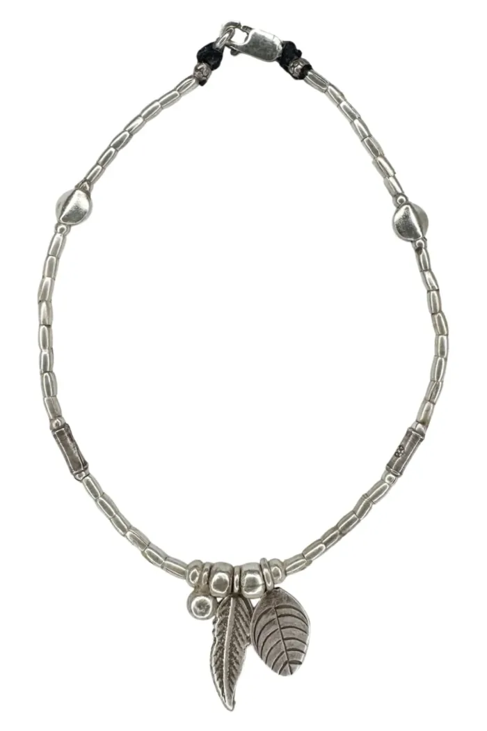 boho luxe pure silver anklet with silver feather and leaf charms. Everyday staple jewellery - designed to wear everyday. Ocean safe