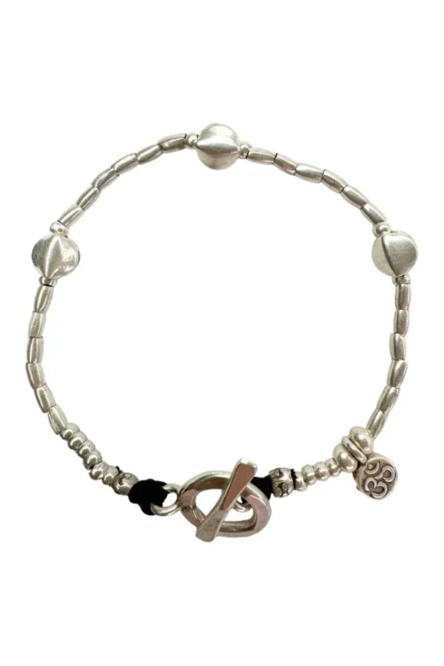 pure silver bracelet with small silver discs. tug proof - perfect for active mums. ocean safe