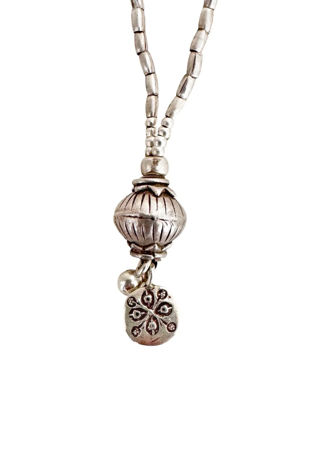pure silver medium to long necklace with detailed feature ball and charm tassel. Ocean safe handmade jewellery