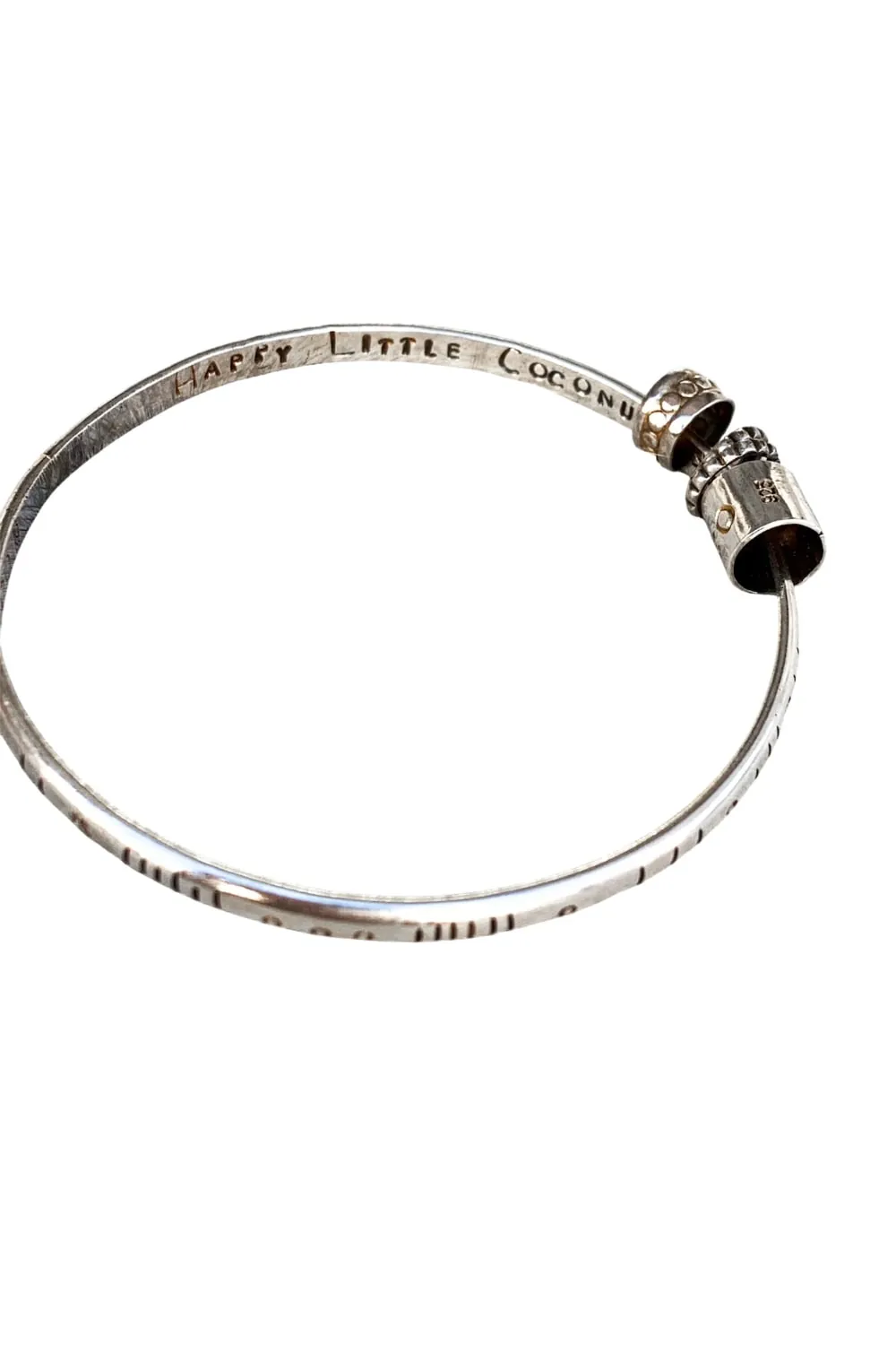 handmade sterling silver bangle. customisable hand stamped option. great for bracelet stacking. water safe