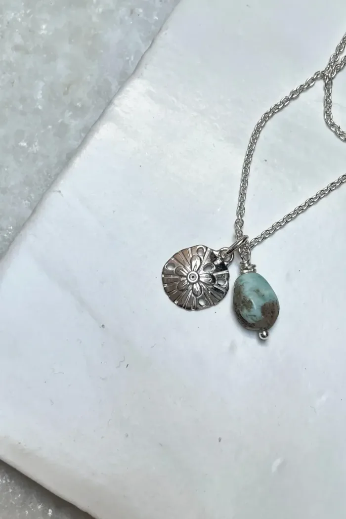 sterling silver necklace with silver sand dollar pendant and Larimar nugget. Handmade in Sydney, Australia. Ocean safe