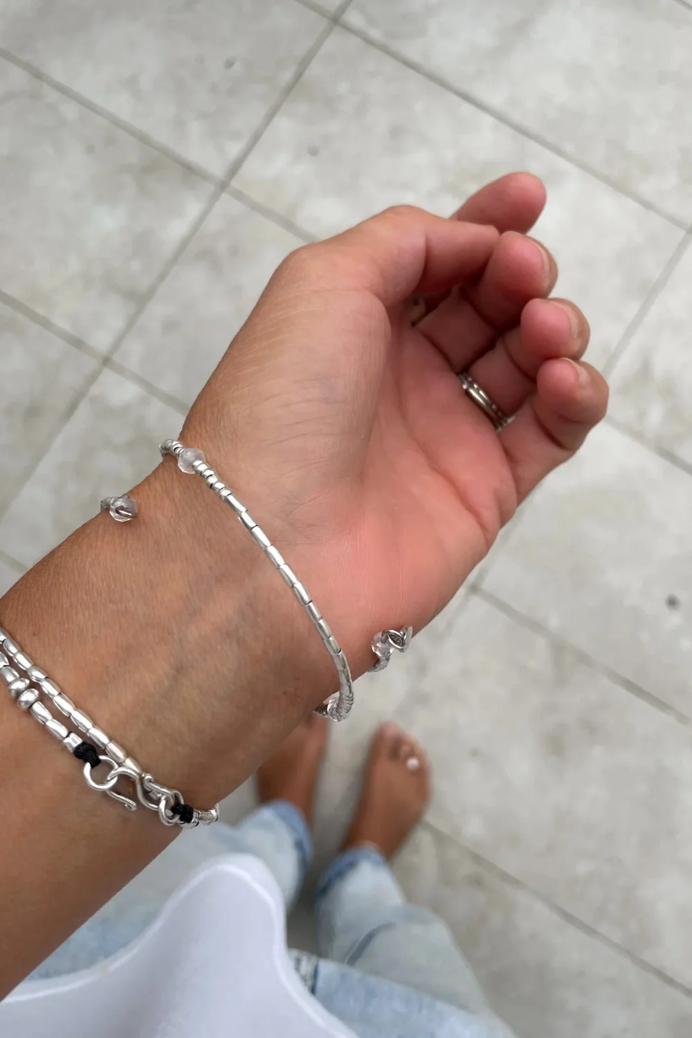 memory wire double wrap bracelet with pure silver and crystal quartz gemstone. Customisable charm pendant