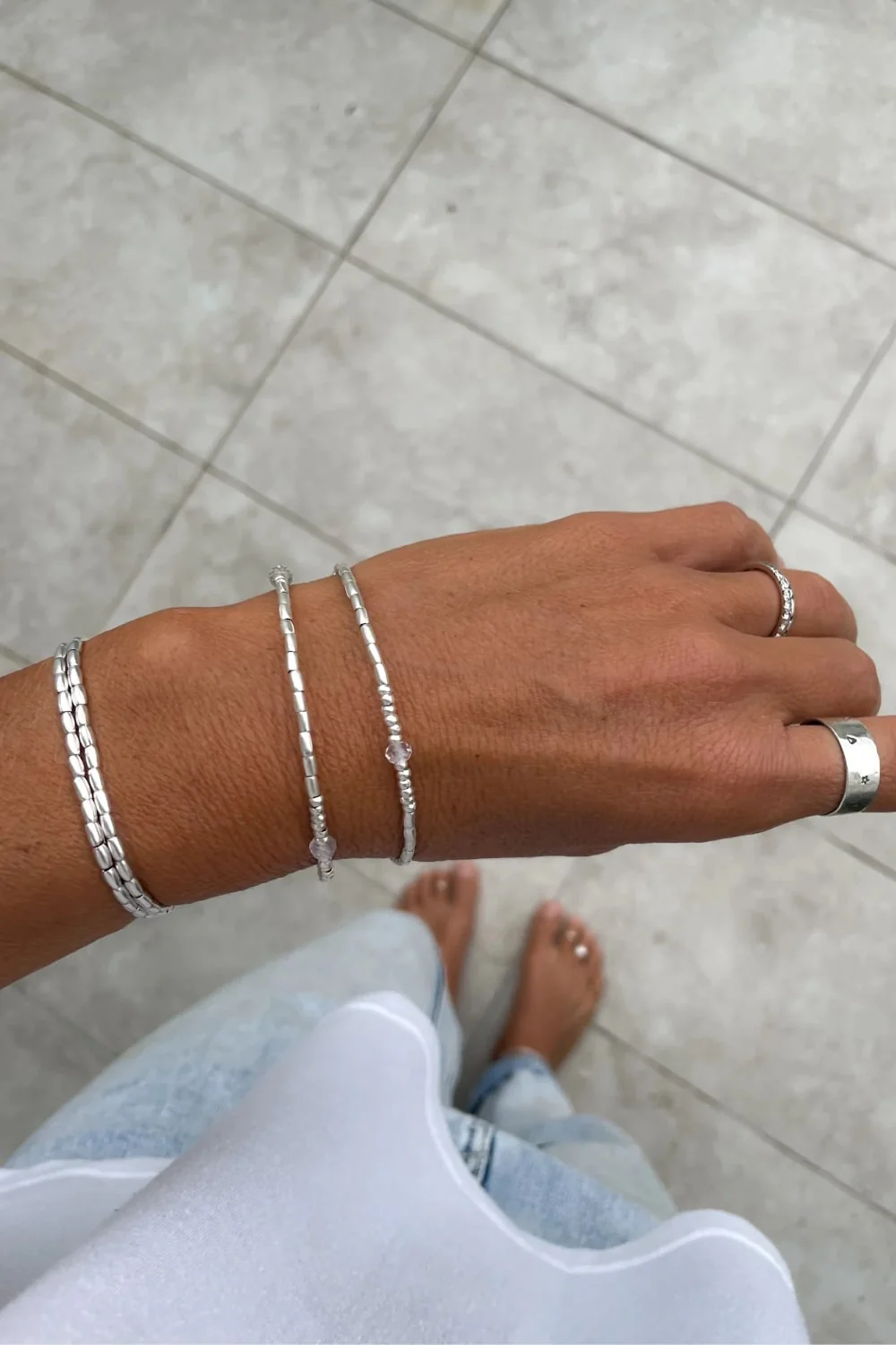 memory wire double wrap bracelet with pure silver and crystal quartz gemstone. Customisable charm pendant