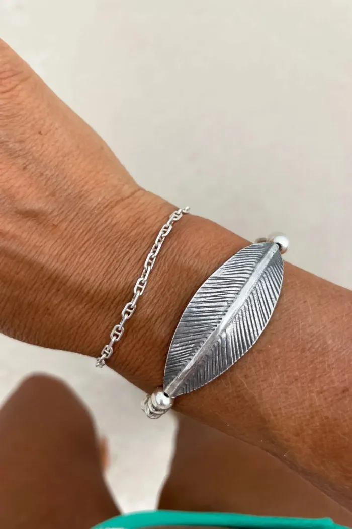 chunky pure silver bracelet perfect for stacking. large curve leaf for bohemian style. easy to slip on stretch elastic curve leaf bracelet