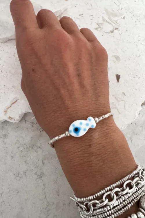 minimal silver bracelet with glass fish handmade ocean safe perfect for a bracelet stack